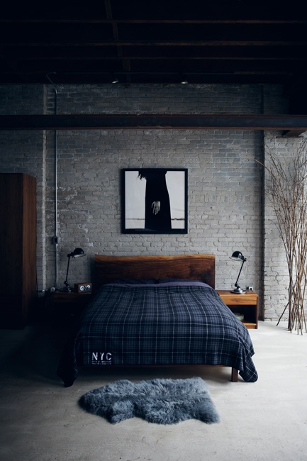 grijze stenen muur in moderne slaapkamer 
